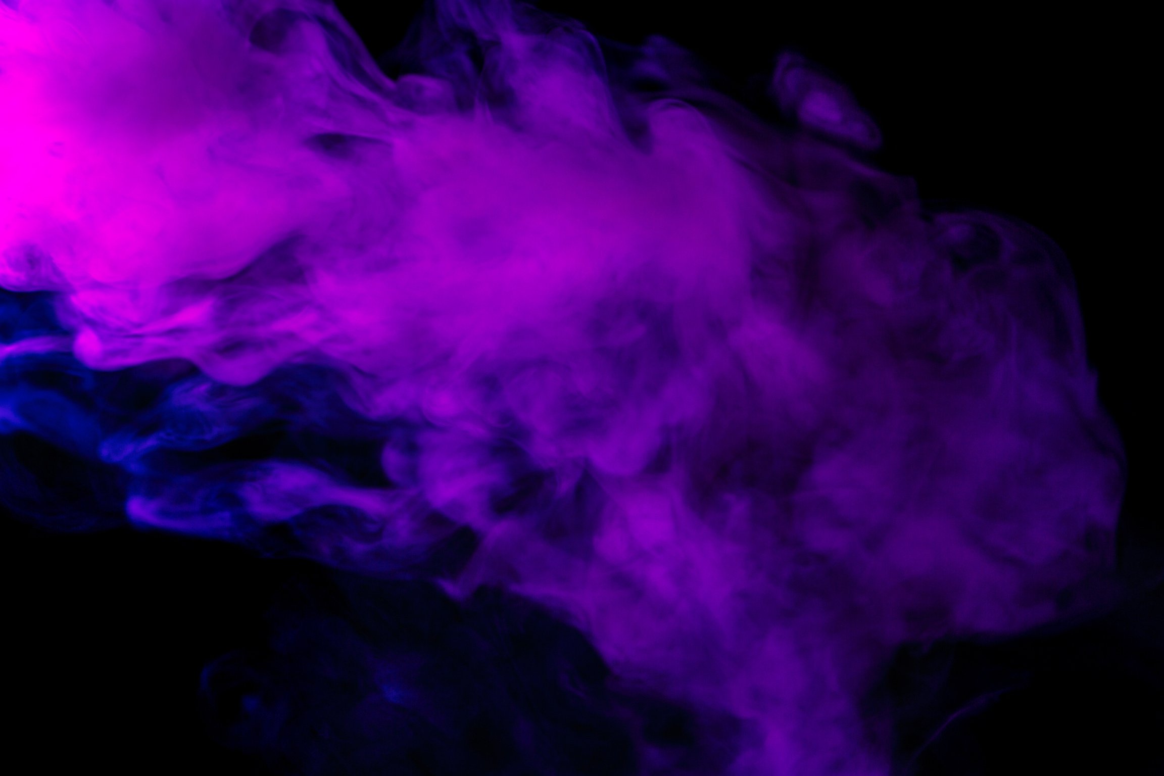 Abstract Purple Smoke Hookah on a Black Background.