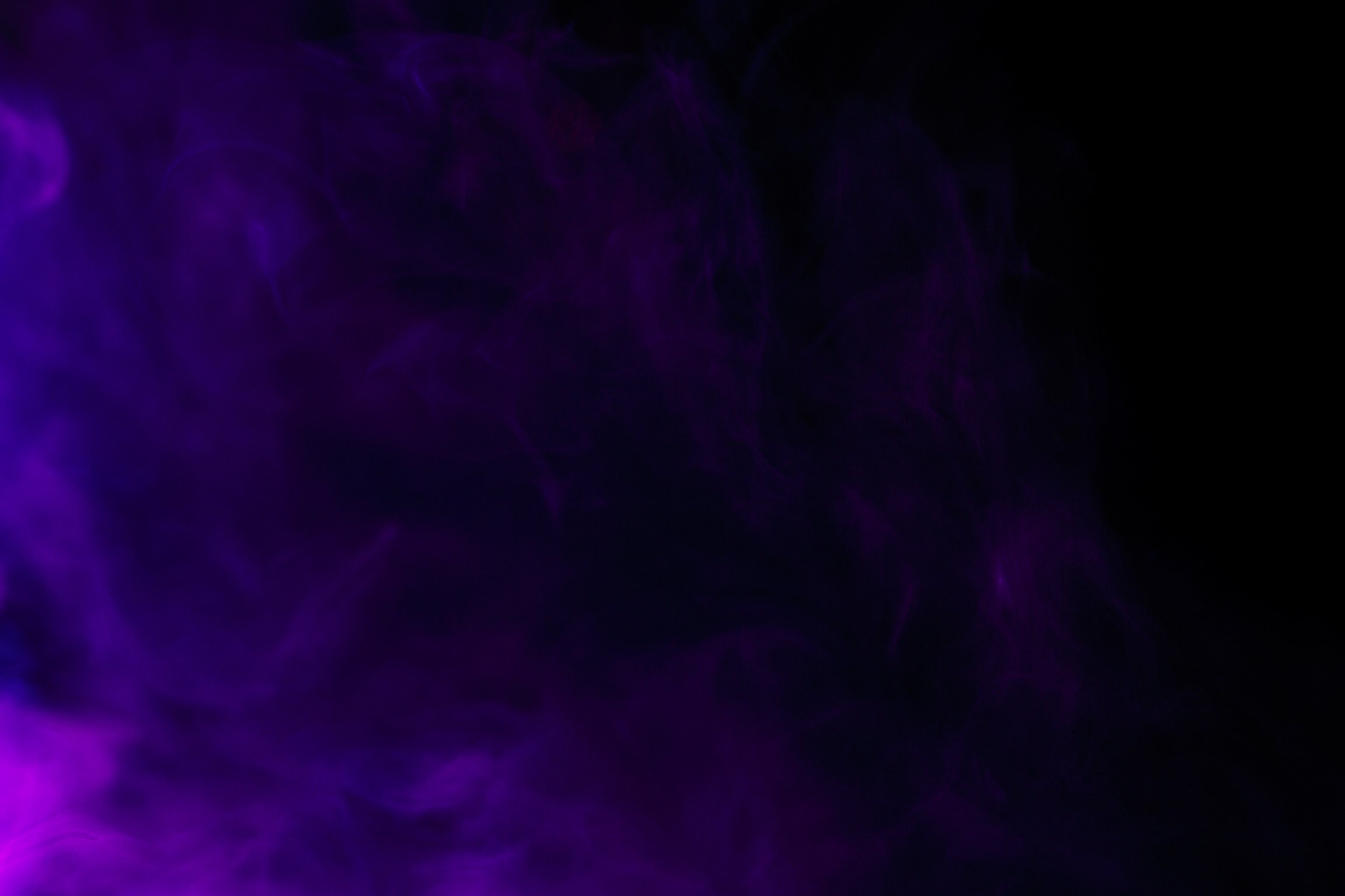Abstract Purple Smoke Hookah on a Black Background.